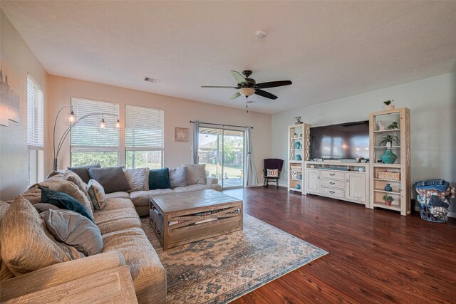 4323 N Vineyard Mdw Ln, Katy, TX 77449 - living area with dark wood finished floors and ceiling fan