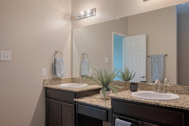 4323 N Vineyard Mdw Ln, Katy, TX 77449 - full bath featuring vanity and a textured wall