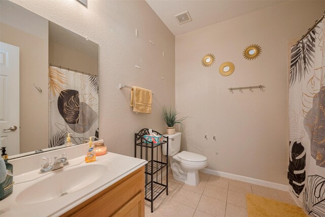 4323 N Vineyard Mdw Ln, Katy, TX 77449 - bathroom with vanity, toilet, tile patterned floors, and curtained shower