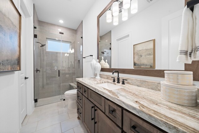 2105 Bennet Ct, Conroe, TX 77384 - bathroom featuring vanity, a stall shower, toilet, and tile patterned flooring