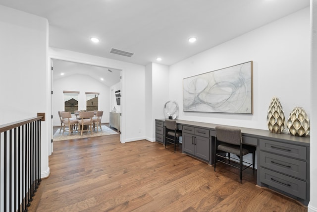 2105 Bennet Ct, Conroe, TX 77384 - office with built in study area, wood finished floors, recessed lighting, and baseboards