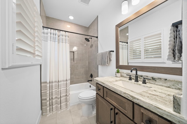 2105 Bennet Ct, Conroe, TX 77384 - full bathroom featuring vanity, shower / tub combo with curtain, toilet, tile patterned floors, and baseboards