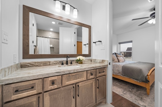2105 Bennet Ct, Conroe, TX 77384 - bathroom with vanity, a ceiling fan, ensuite bath, a shower with curtain, and recessed lighting