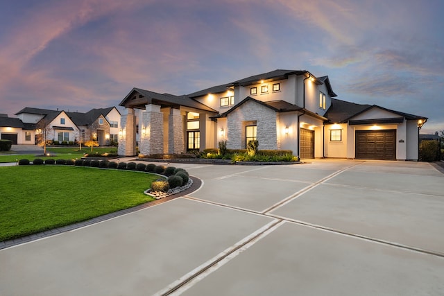 2105 Bennet Ct, Conroe, TX 77384 - view of front of home with stone siding, concrete driveway, a front lawn, a garage, and stucco siding