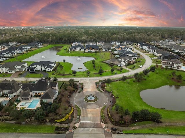 2105 Bennet Ct, Conroe, TX 77384 - aerial view at dusk of a water view and a residential view