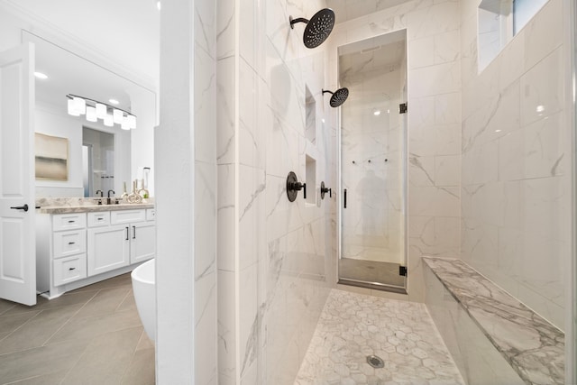 2105 Bennet Ct, Conroe, TX 77384 - bathroom with a marble finish shower, vanity, tile patterned flooring, and a freestanding tub