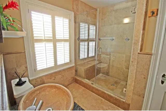 1216 S Shepherd Dr, Houston, TX 77019 - bathroom featuring a stall shower and toilet