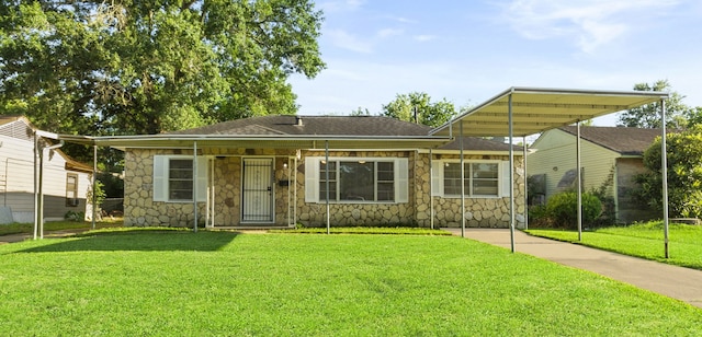 6034 Belmark St, Houston, TX 77033 - view of front of house with stone siding and a front lawn