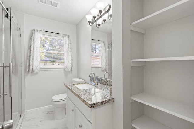6034 Belmark St, Houston, TX 77033 - full bathroom featuring vanity, toilet, a stall shower, marble look tile flooring, and baseboards