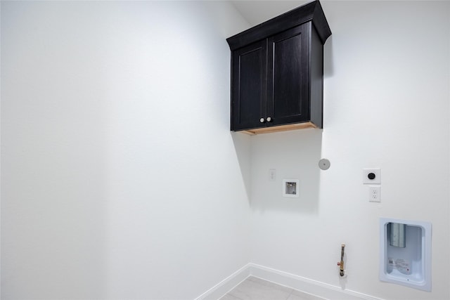829 Laguna Green Ln, Katy, TX 77493 - laundry room featuring gas dryer hookup, hookup for an electric dryer, washer hookup, baseboards, and cabinet space