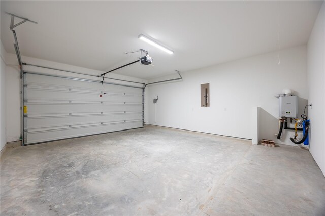 829 Laguna Green Ln, Katy, TX 77493 - garage featuring a garage door opener, electric panel, and water heater