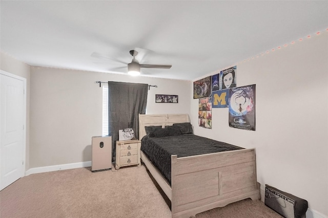 5014 Lillian St, Houston, TX 77007 - bedroom featuring carpet floors, a ceiling fan, and baseboards