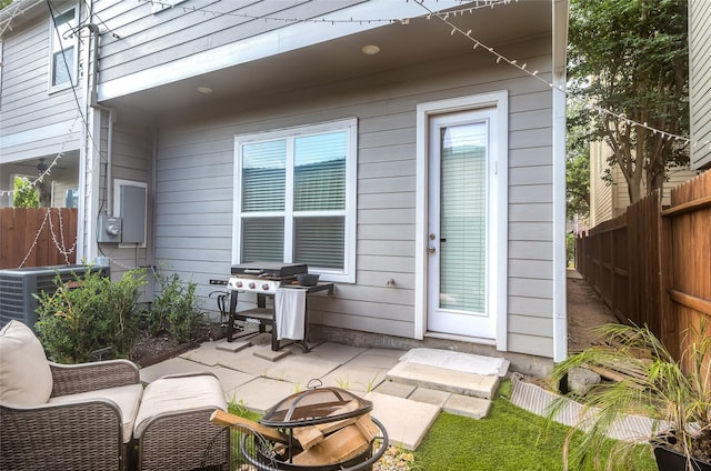 5014 Lillian St, Houston, TX 77007 - view of patio / terrace featuring an outdoor fire pit, central AC, and a grill