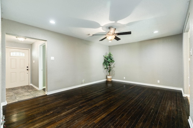 105 Wisteria St, Lake Jackson, TX 77566 - unfurnished room featuring hardwood / wood-style flooring, a ceiling fan, and baseboards
