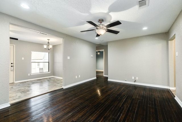 105 Wisteria St, Lake Jackson, TX 77566 - spare room featuring a ceiling fan, hardwood / wood-style floors, a chandelier, baseboards, and a textured ceiling