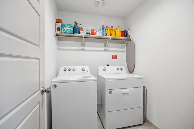 12717 Ermine St, Houston, TX 77047 - laundry room with washing machine and clothes dryer