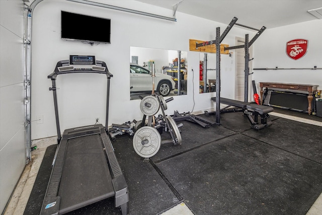 12717 Ermine St, Houston, TX 77047 - exercise area with a garage