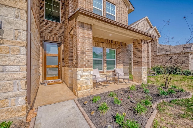 21450 Petherton Dr, Tomball, TX 77375 - property entrance featuring brick siding and stone siding