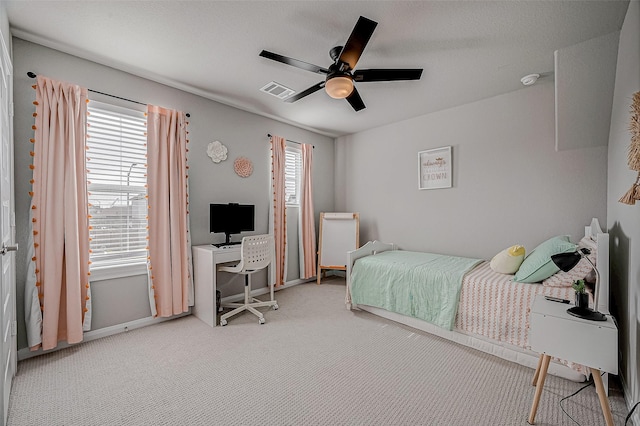 21450 Petherton Dr, Tomball, TX 77375 - carpeted bedroom with an office area, a ceiling fan, and baseboards