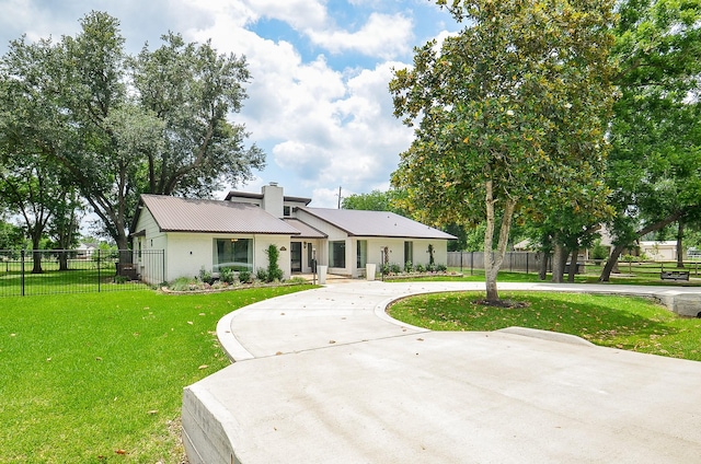 36615 Maverick Rd, Simonton, TX 77485 - view of front of property featuring a chimney and curved driveway