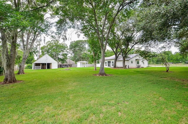 36615 Maverick Rd, Simonton, TX 77485 - view of grassy yard featuring an outdoor structure and a pole building