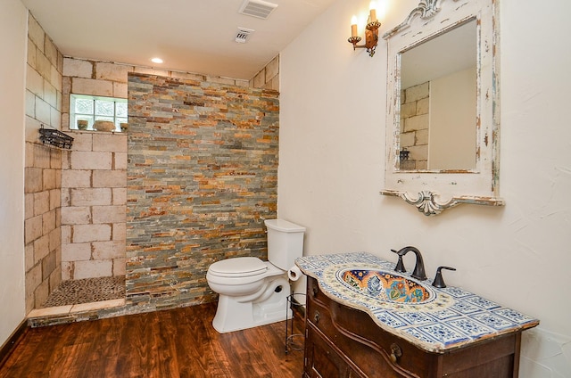 36615 Maverick Rd, Simonton, TX 77485 - full bath featuring wood finished floors, a walk in shower, toilet, and vanity