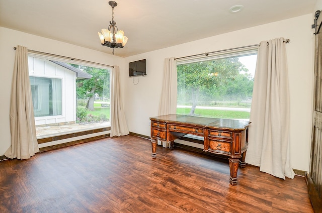 36615 Maverick Rd, Simonton, TX 77485 - dining room featuring a chandelier, dark wood finished floors, and baseboards
