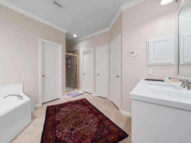 23647 Litchfield Bend Ln, Katy, TX 77494 - full bathroom featuring a shower stall, crown molding, double vanity, a garden tub, and tile patterned floors