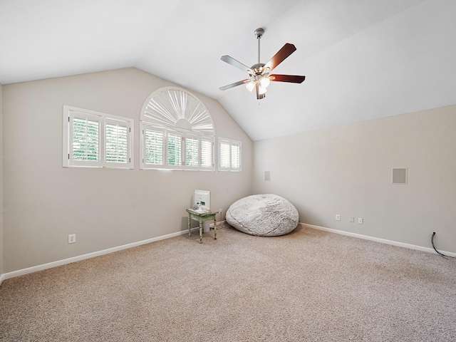 23647 Litchfield Bend Ln, Katy, TX 77494 - bonus room featuring a ceiling fan, carpet flooring, lofted ceiling, and baseboards