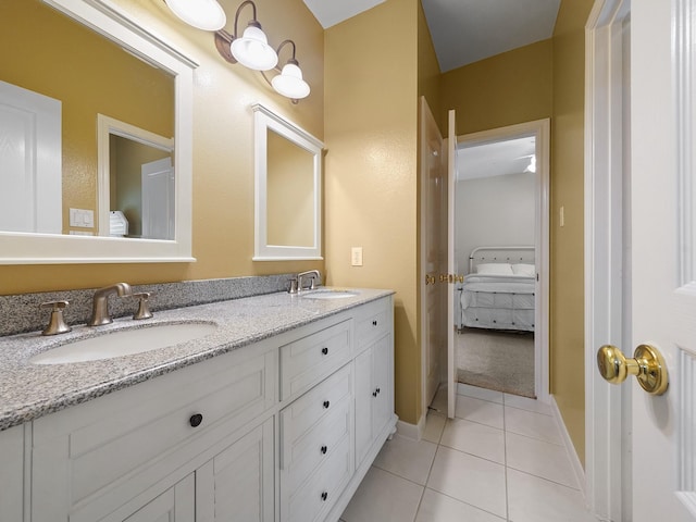23647 Litchfield Bend Ln, Katy, TX 77494 - full bathroom featuring tile patterned flooring, ensuite bathroom, double vanity, and baseboards