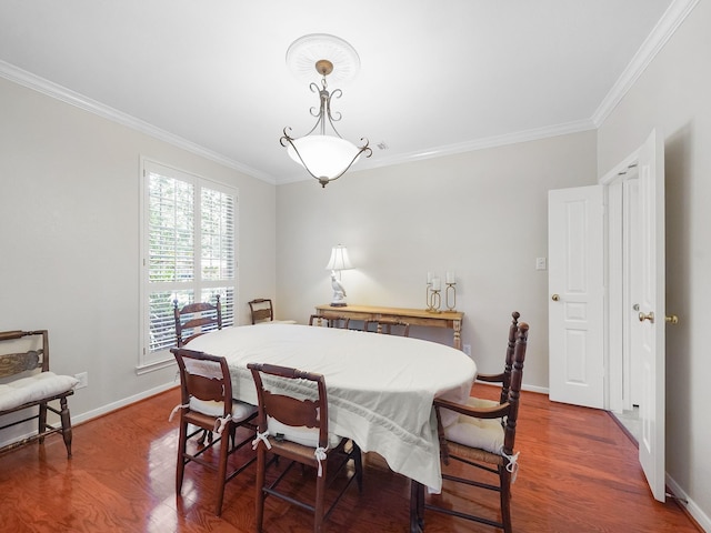 23647 Litchfield Bend Ln, Katy, TX 77494 - dining room with ornamental molding, wood finished floors, and baseboards