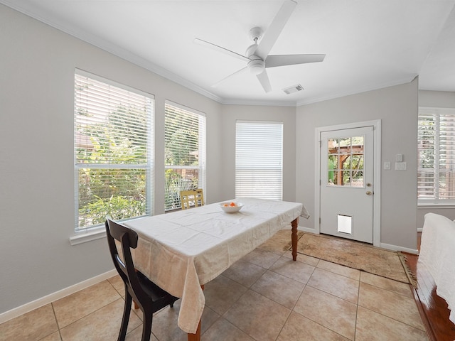23647 Litchfield Bend Ln, Katy, TX 77494 - dining room featuring healthy amount of natural light, light tile patterned floors, baseboards, a ceiling fan, and ornamental molding