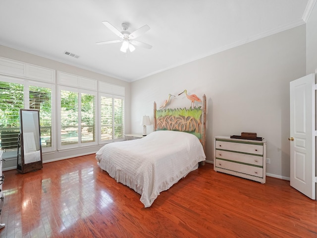23647 Litchfield Bend Ln, Katy, TX 77494 - bedroom featuring wood finished floors, ornamental molding, and a ceiling fan