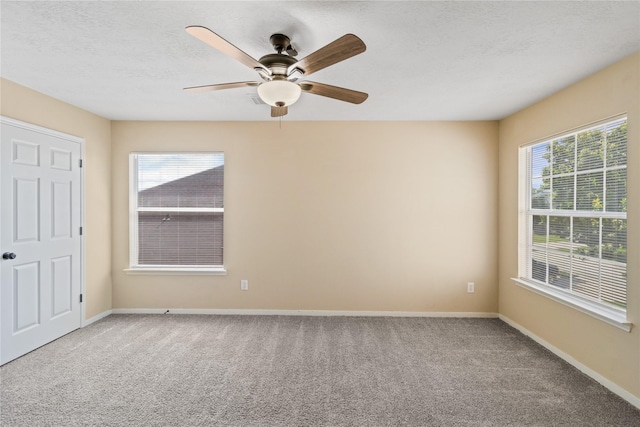 5410 Thyme Ln, Baytown, TX 77521 - carpeted spare room featuring ceiling fan, baseboards, and a textured ceiling