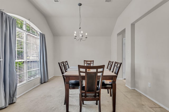 11823 Lois Ln, Pinehurst, TX 77362 - dining room featuring light carpet, vaulted ceiling, a chandelier, and baseboards
