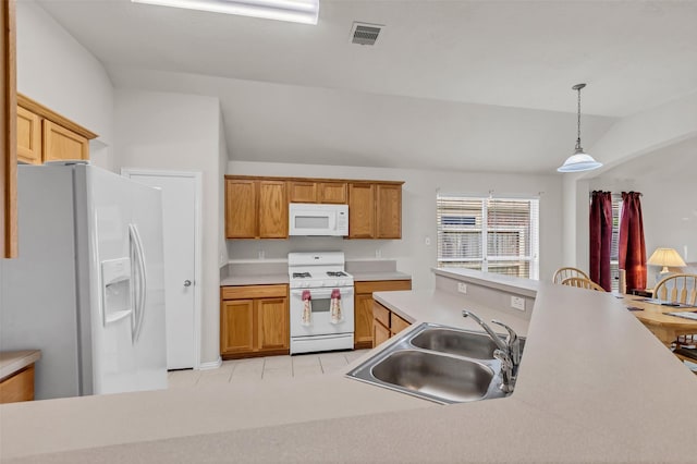 11823 Lois Ln, Pinehurst, TX 77362 - kitchen with white appliances, a sink, lofted ceiling, light countertops, and pendant lighting