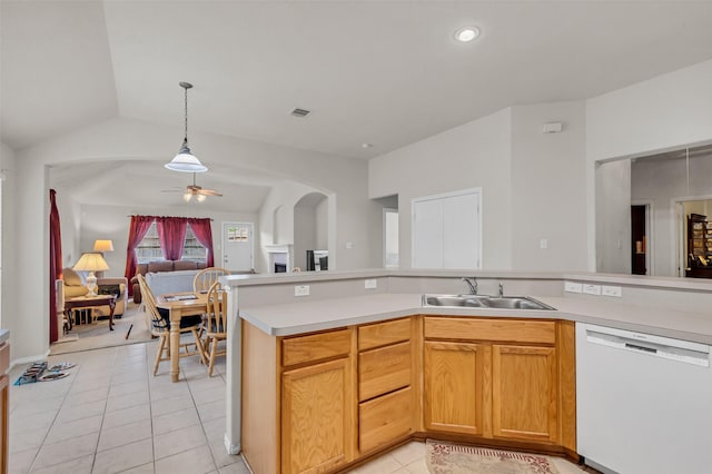11823 Lois Ln, Pinehurst, TX 77362 - kitchen featuring white dishwasher, open floor plan, a sink, a ceiling fan, and light countertops