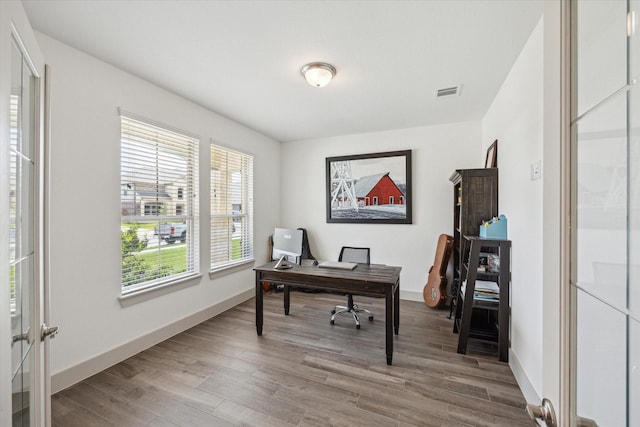 1685 Daylight Lake Dr, Katy, TX 77493 - office with wood finished floors, baseboards, and french doors