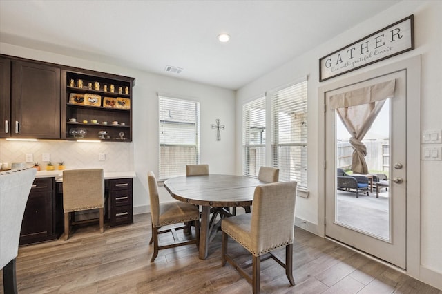1685 Daylight Lake Dr, Katy, TX 77493 - dining area with light wood-style flooring and recessed lighting