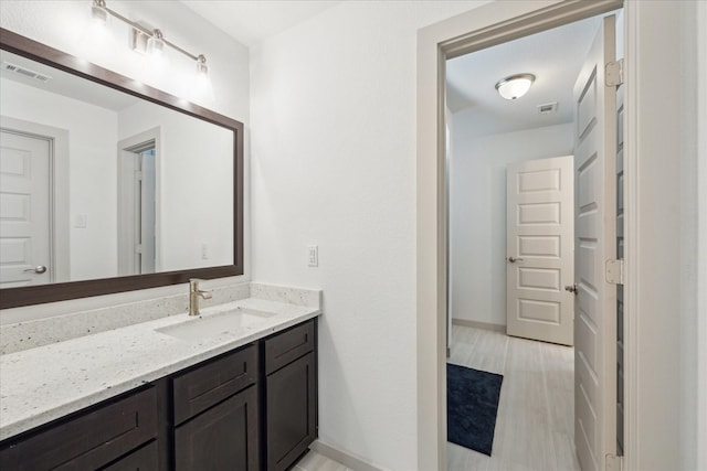 1685 Daylight Lake Dr, Katy, TX 77493 - bathroom featuring vanity and baseboards