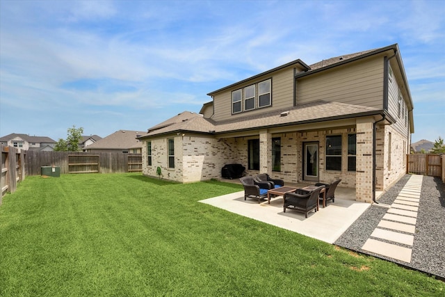 1685 Daylight Lake Dr, Katy, TX 77493 - rear view of property with brick siding, a patio, roof with shingles, and an outdoor living space