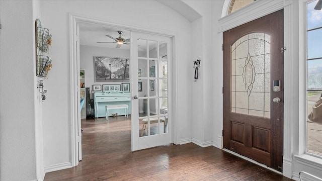 19603 Pitchstone Dr, Tomball, TX 77377 - foyer entrance with dark wood-style floors, baseboards, ceiling fan, and plenty of natural light