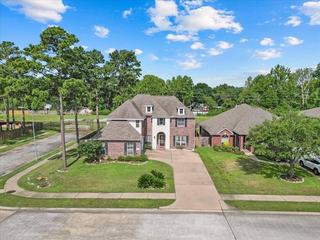 19603 Pitchstone Dr, Tomball, TX 77377 - view of front of house featuring brick siding and driveway