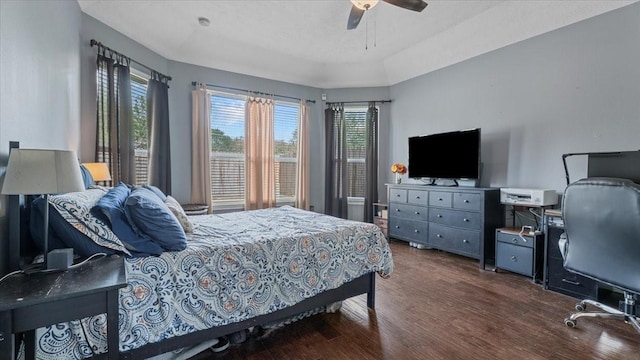 19603 Pitchstone Dr, Tomball, TX 77377 - bedroom featuring wood finished floors, multiple windows, a ceiling fan, and an office area