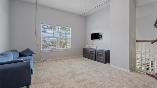 19603 Pitchstone Dr, Tomball, TX 77377 - sitting room featuring carpet floors, attic access, and baseboards