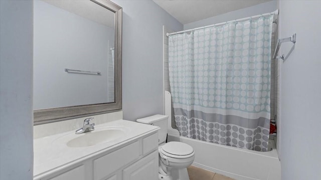 19603 Pitchstone Dr, Tomball, TX 77377 - full bathroom featuring toilet, vanity, shower / bath combo, and tile patterned floors
