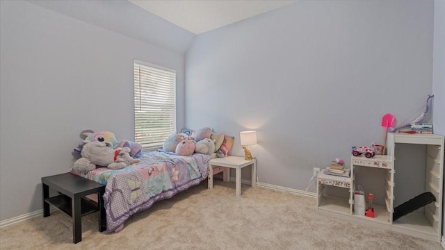 19603 Pitchstone Dr, Tomball, TX 77377 - carpeted bedroom featuring vaulted ceiling and baseboards