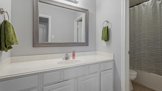19603 Pitchstone Dr, Tomball, TX 77377 - bathroom with vanity, toilet, and tile patterned floors