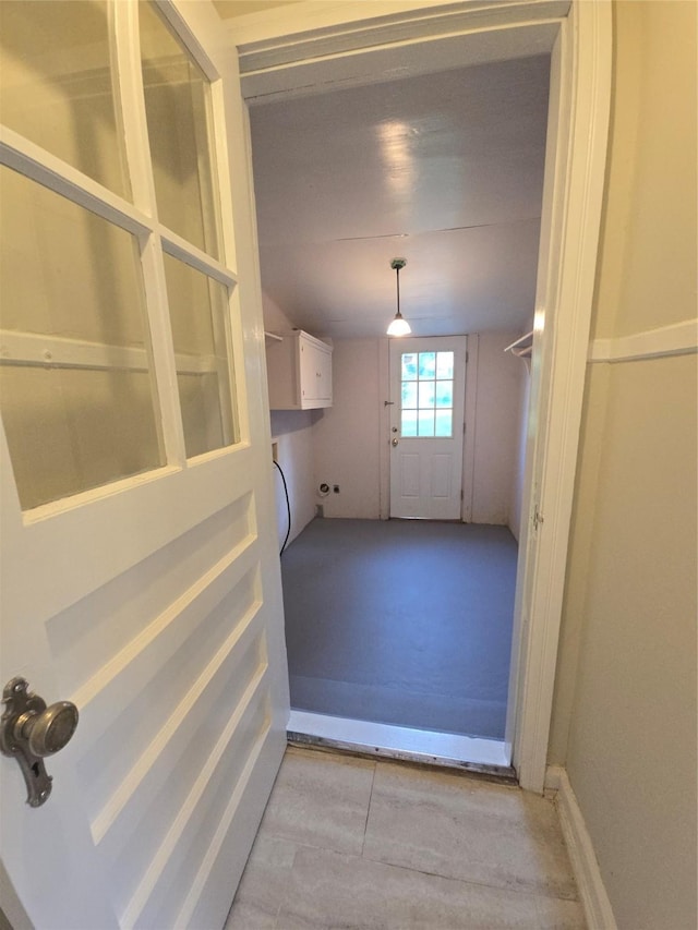301 Harold St, Crockett, TX 75835 - unfurnished dining area featuring baseboards
