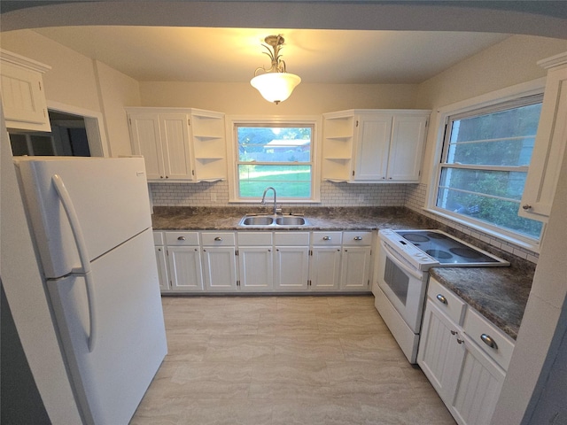 301 Harold St, Crockett, TX 75835 - kitchen featuring open shelves, a sink, white appliances, white cabinets, and decorative backsplash